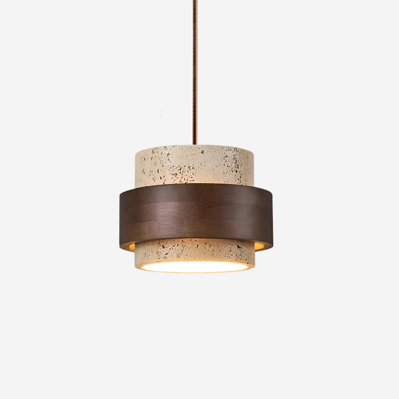 Pendant light with terrazzo shade and bronze band on a white background