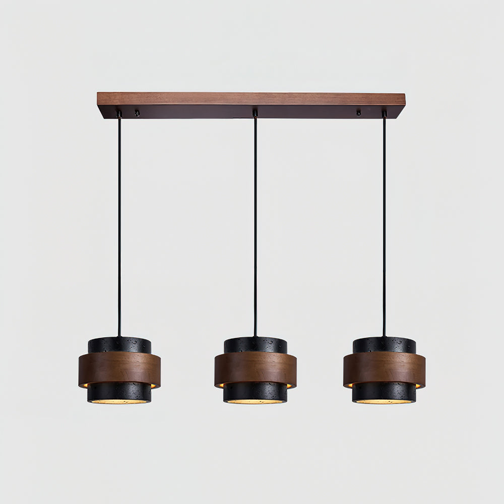 Three pendant lights with wooden finish and black accents hanging from a wooden fixture against a light gray background.