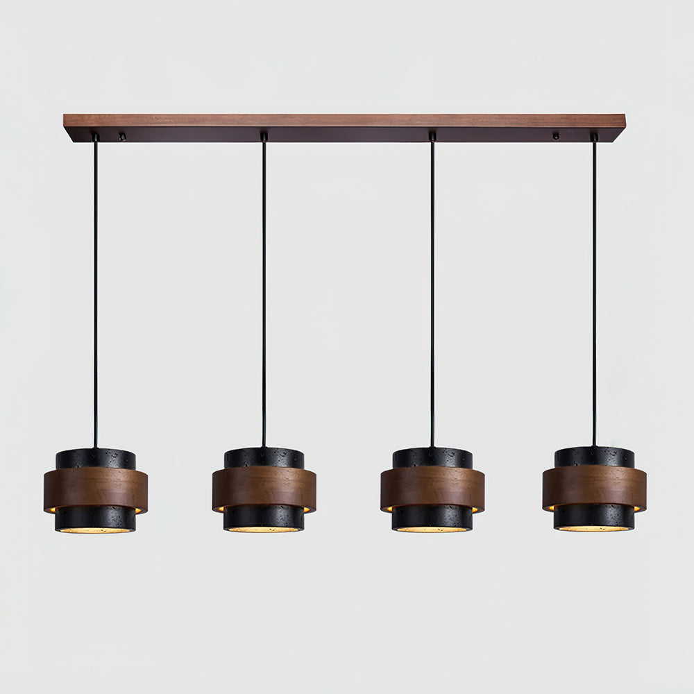 Wooden pendant light fixture with four cylindrical metal shades on a white background