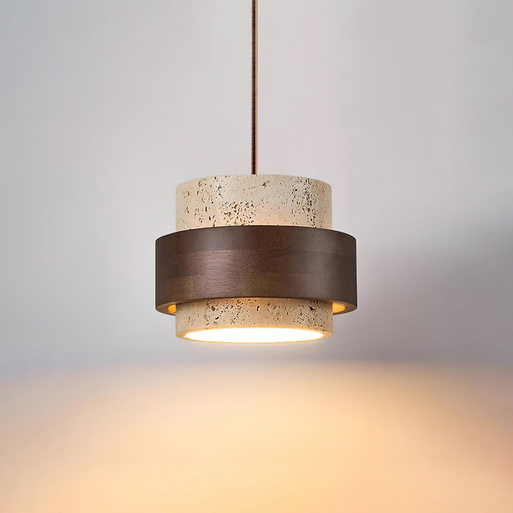 Pendant light with cork-like texture and bronze finish on a neutral background