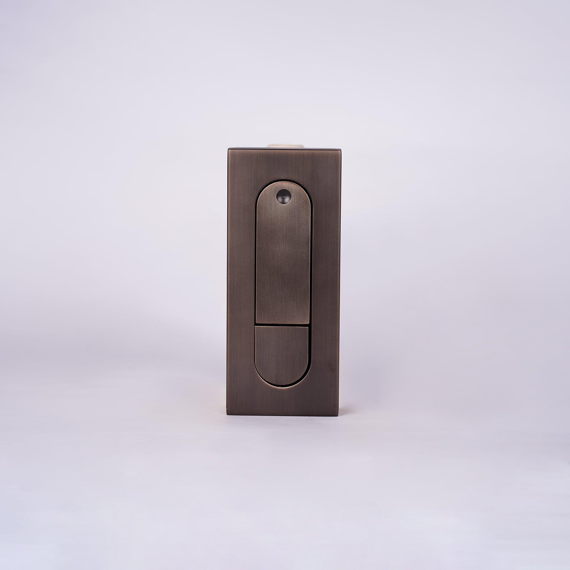Bronze door handle on a white background