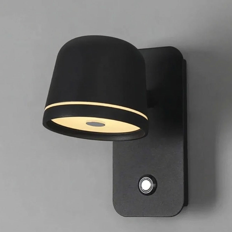 Black wall-mounted outdoor light fixture on a gray background