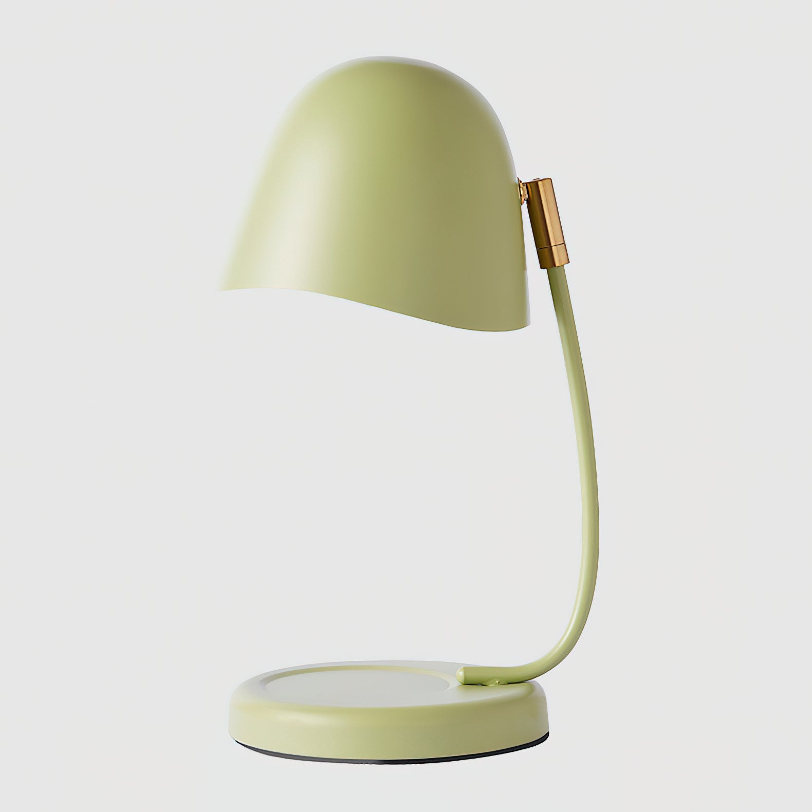 Green desk lamp on a white background