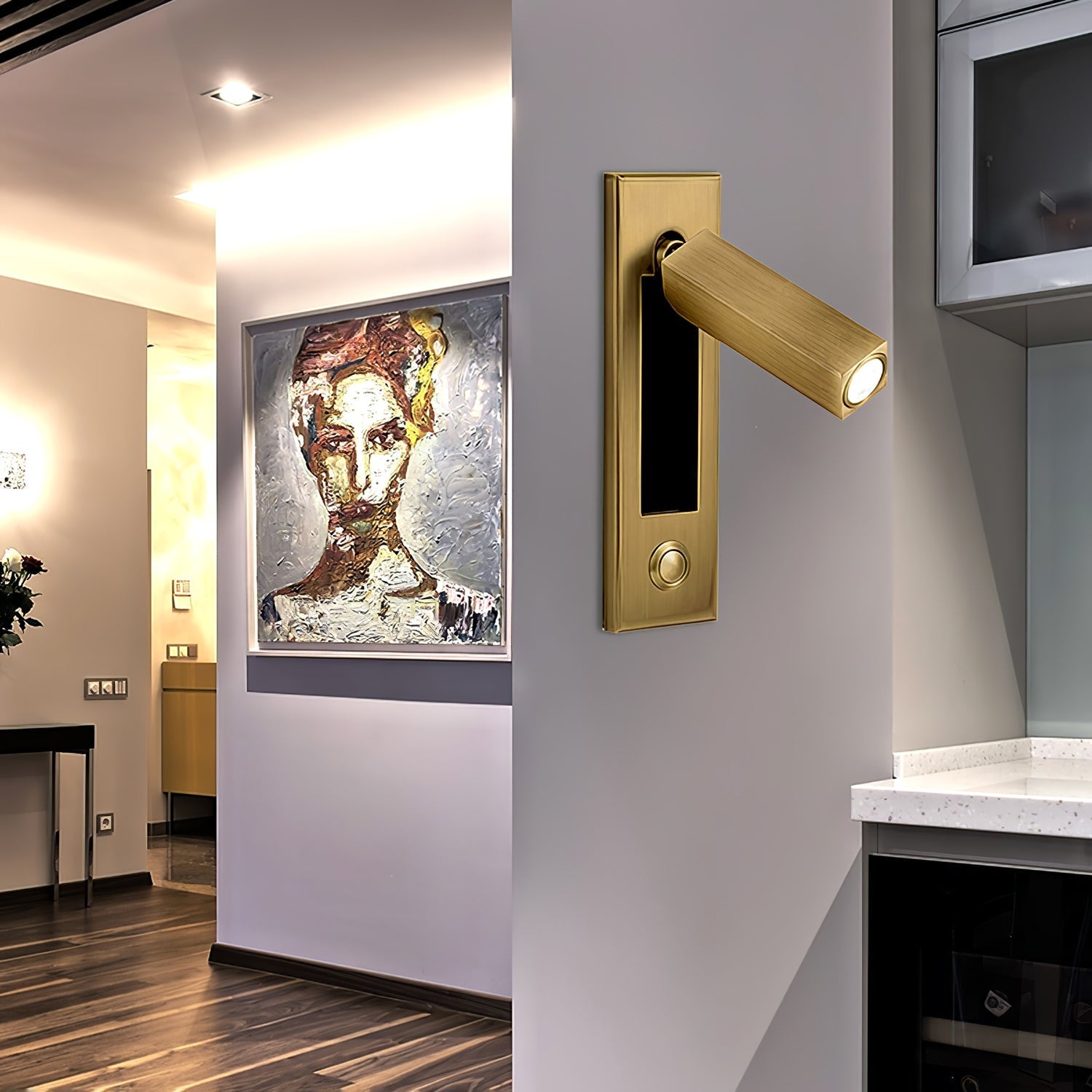 Modern interior design with a gold door handle and wall-mounted electronic lock.