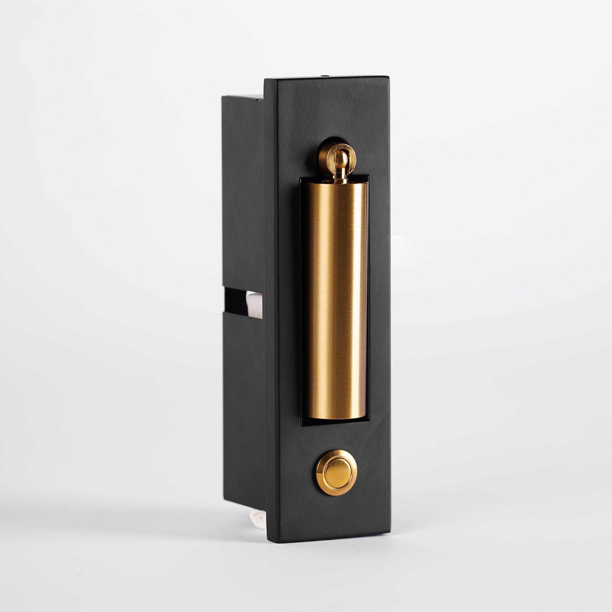 Black and gold door handle on a white background