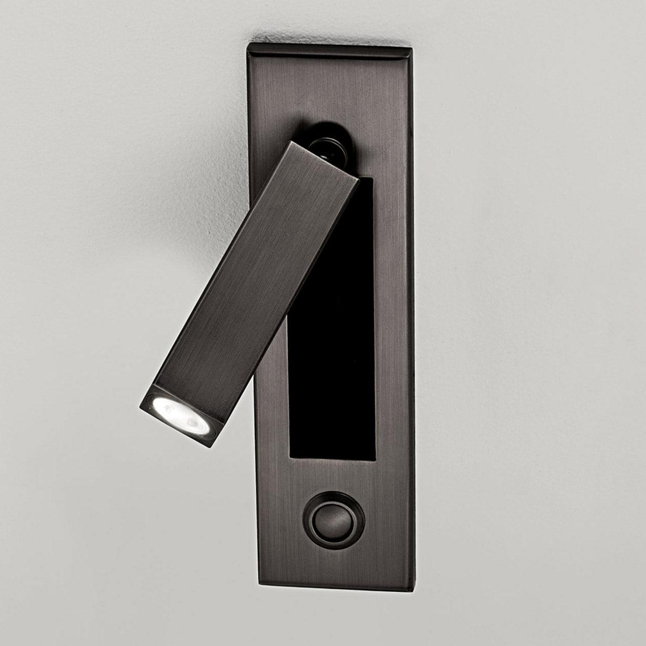 Modern door handle with light on a gray background