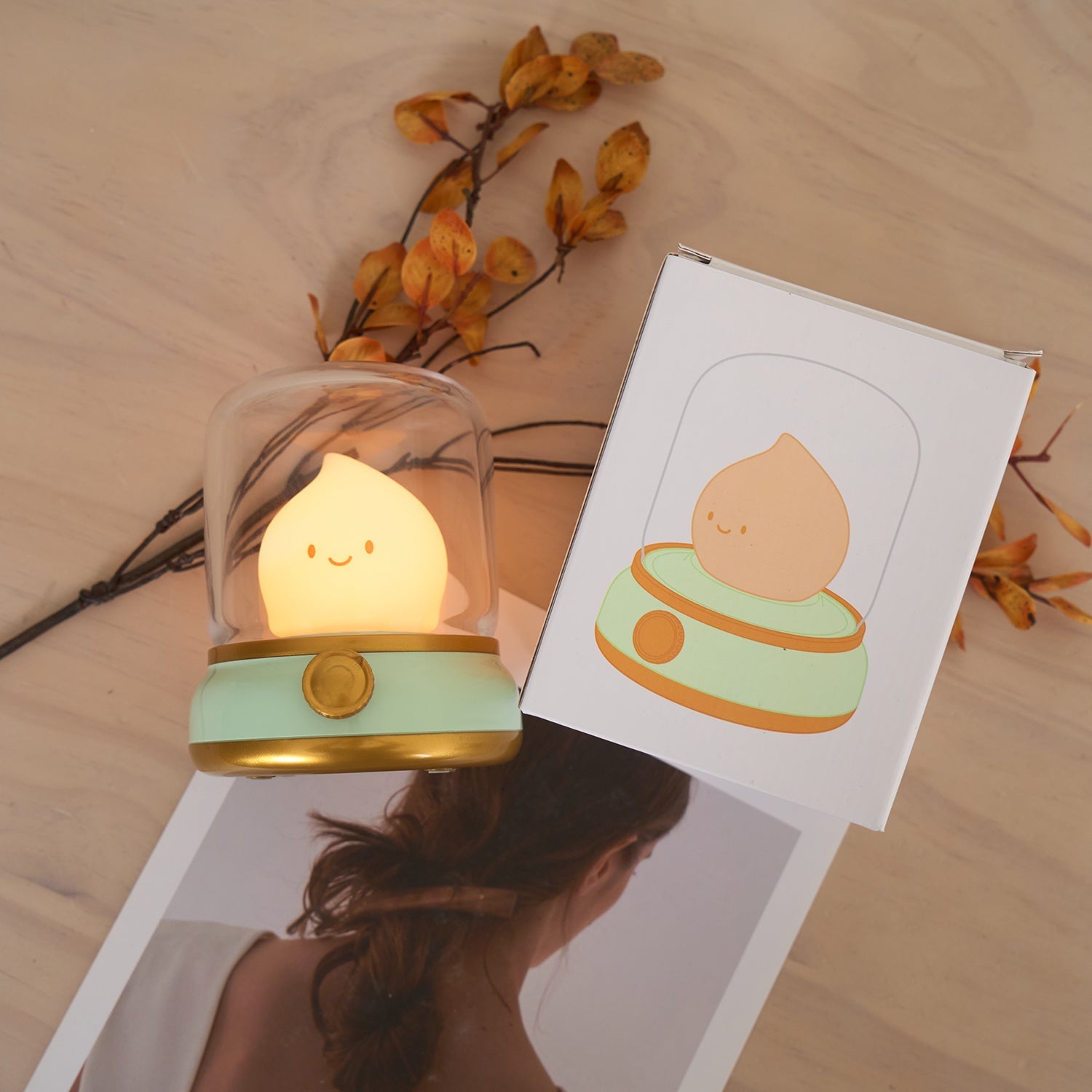 Cute lamp with a cartoon design on a wooden surface