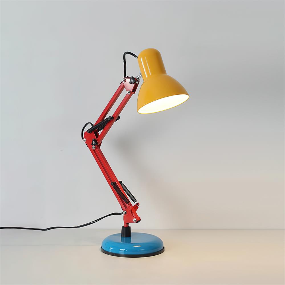 Colorful desk lamp with yellow shade, red arm, and blue base on a light gray background