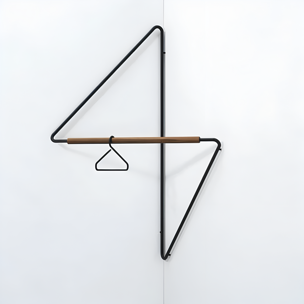 Black metal wall-mounted coat rack with a triangular design on a white background