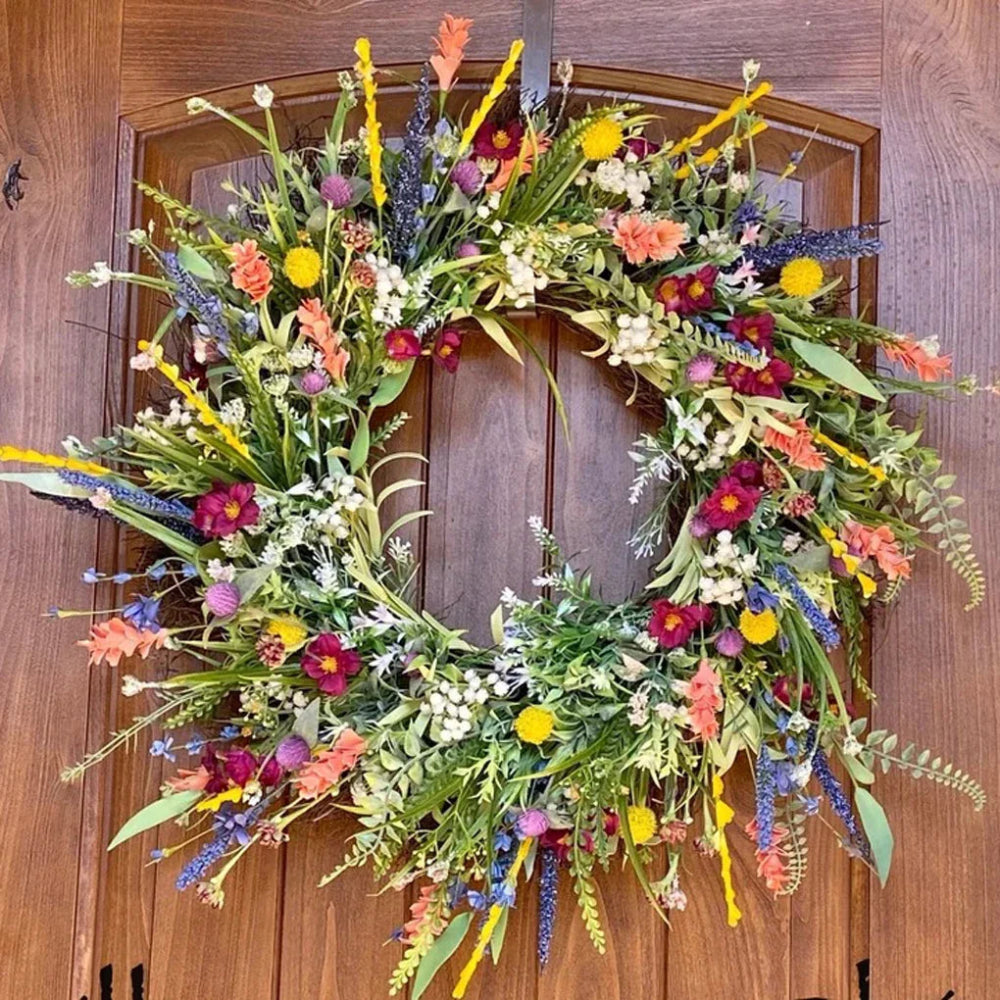 Colorful floral wreath on a wooden door