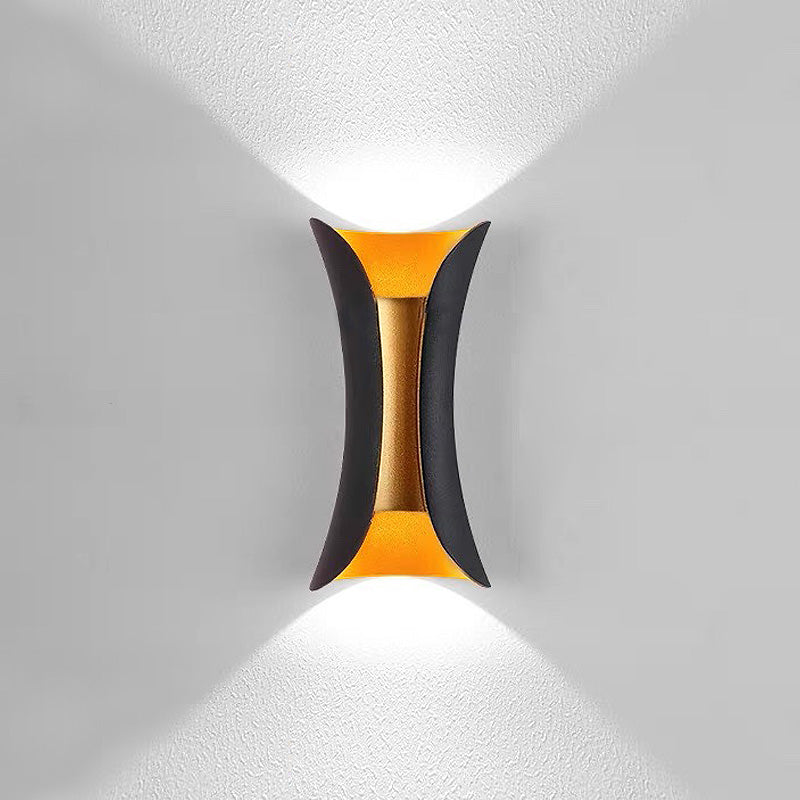 Modern wall light fixture on a gray wall
