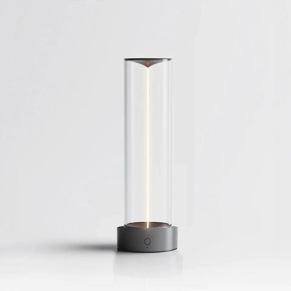 Cylindrical lamp with glass cover on a white background