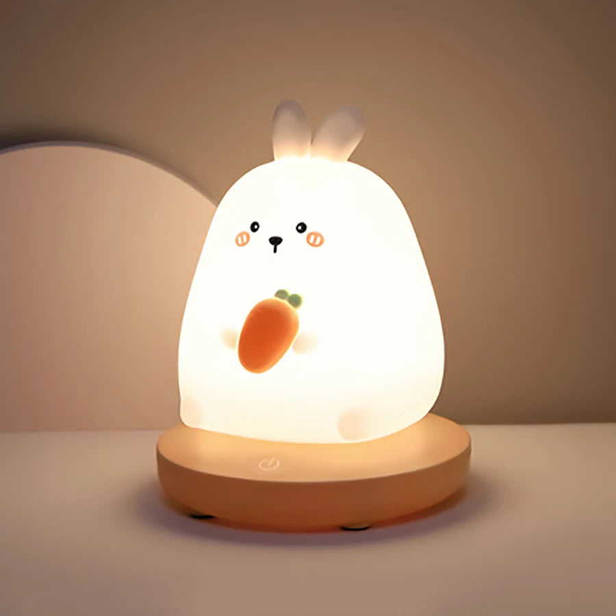Cute rabbit-shaped night light on a neutral background