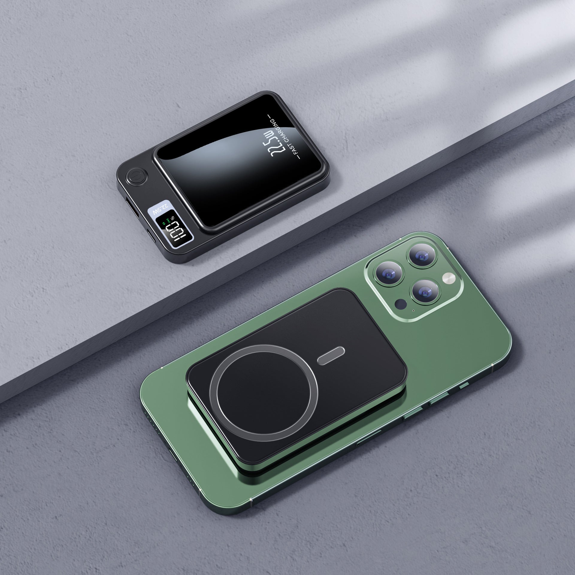 Green phone case with wireless charging pad on a gray surface