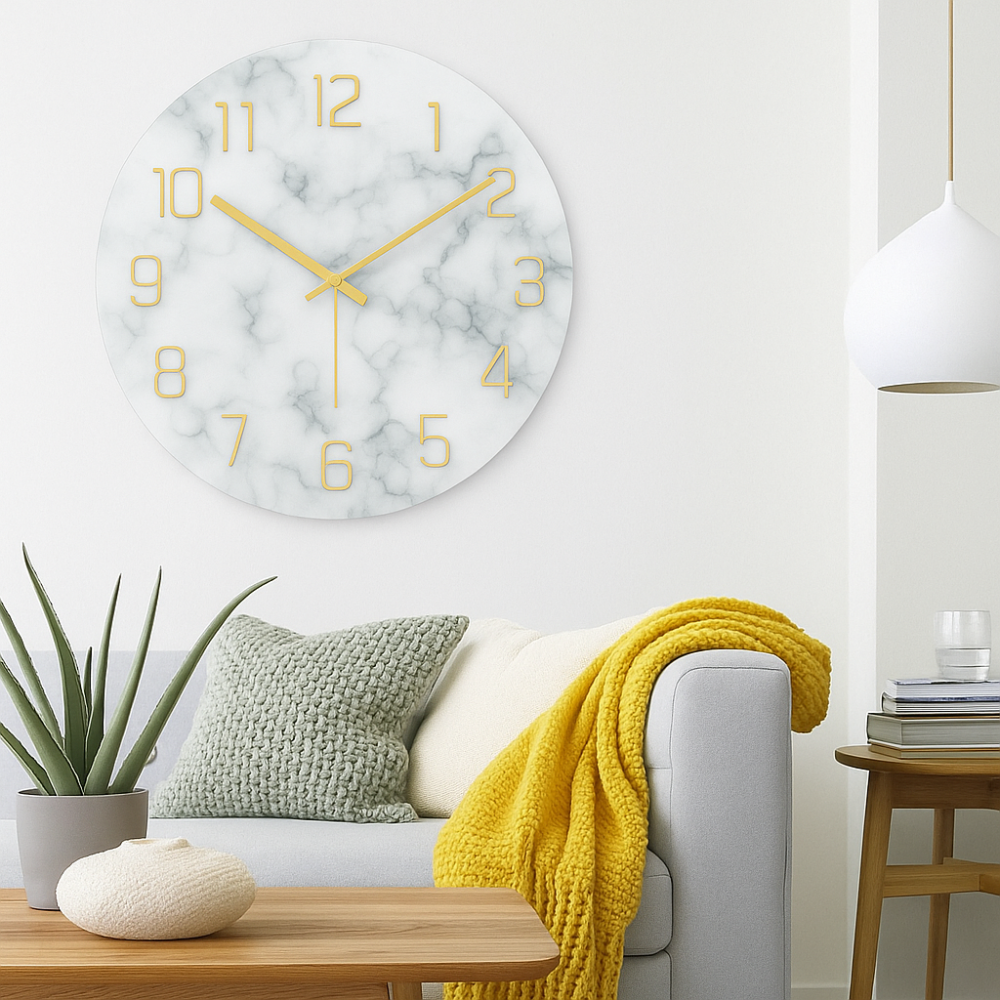 Living room with a marble-patterned clock, yellow blanket, and green pillow.