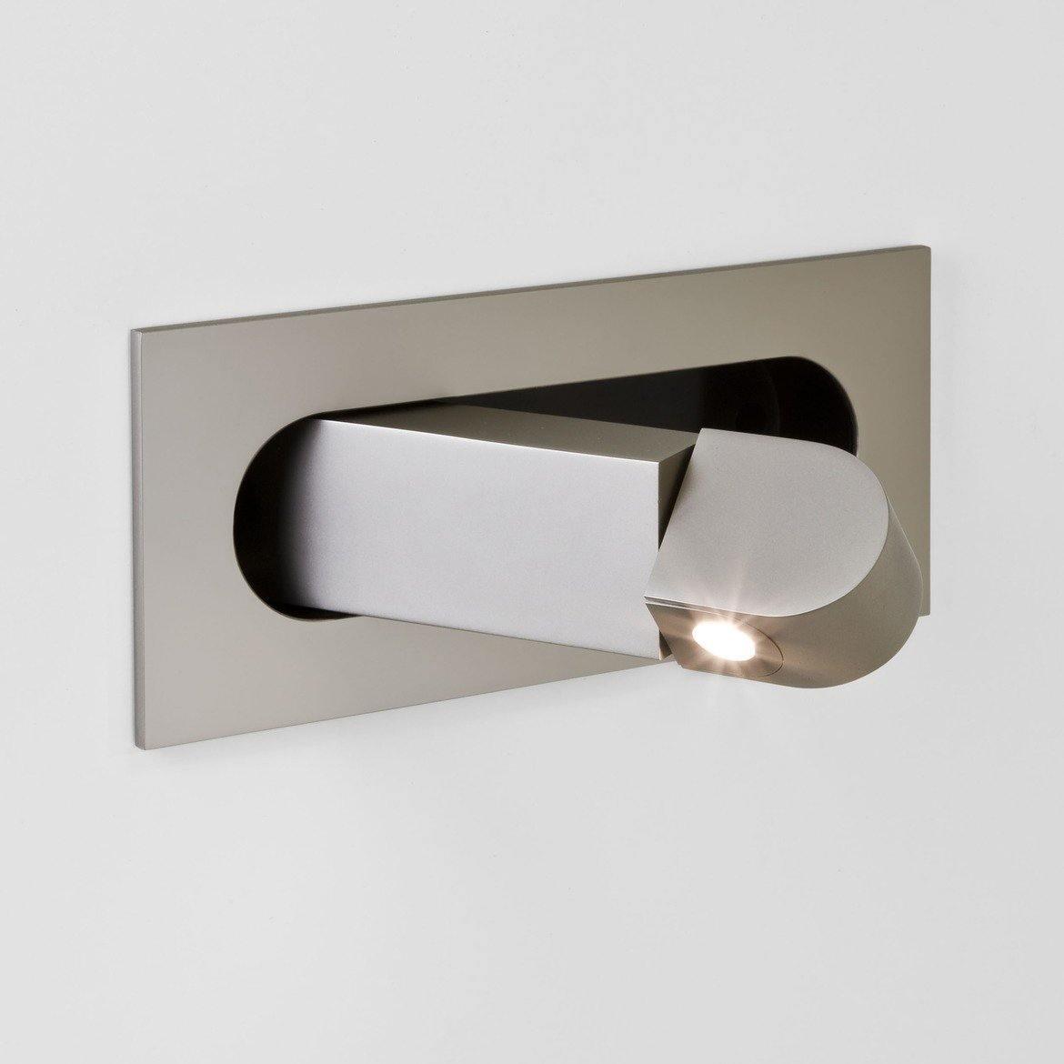 Modern wall-mounted light fixture on a white background