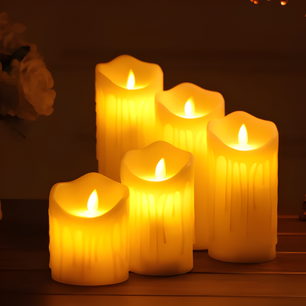 Set of five glowing candles on a wooden surface with a warm glow.