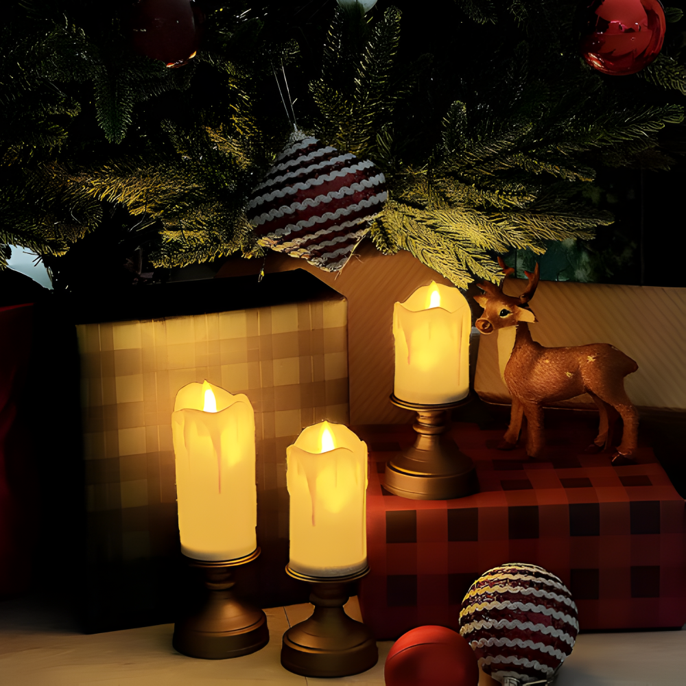Decorative setup with candles, a deer figurine, and Christmas ornaments on a checkered surface.