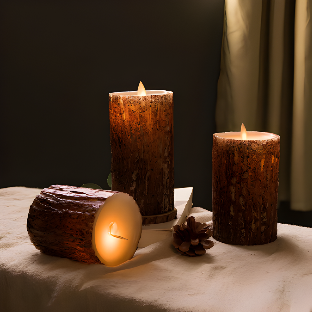 Three rustic candles on a textured surface with a dark background