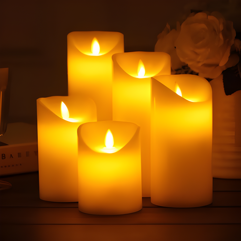 Set of lit candles on a dark background