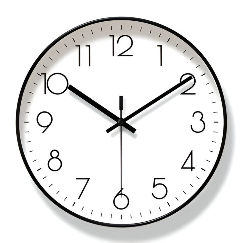 Round wall clock with black frame and white face on a white background