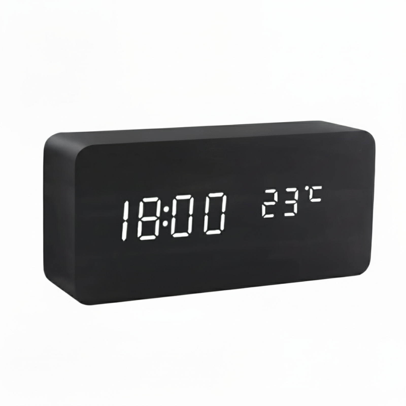 Black digital clock with LED display on a white background
