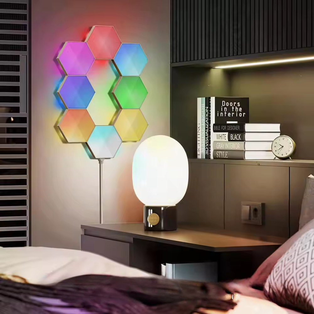 Colorful hexagonal LED wall light in a modern bedroom setting.