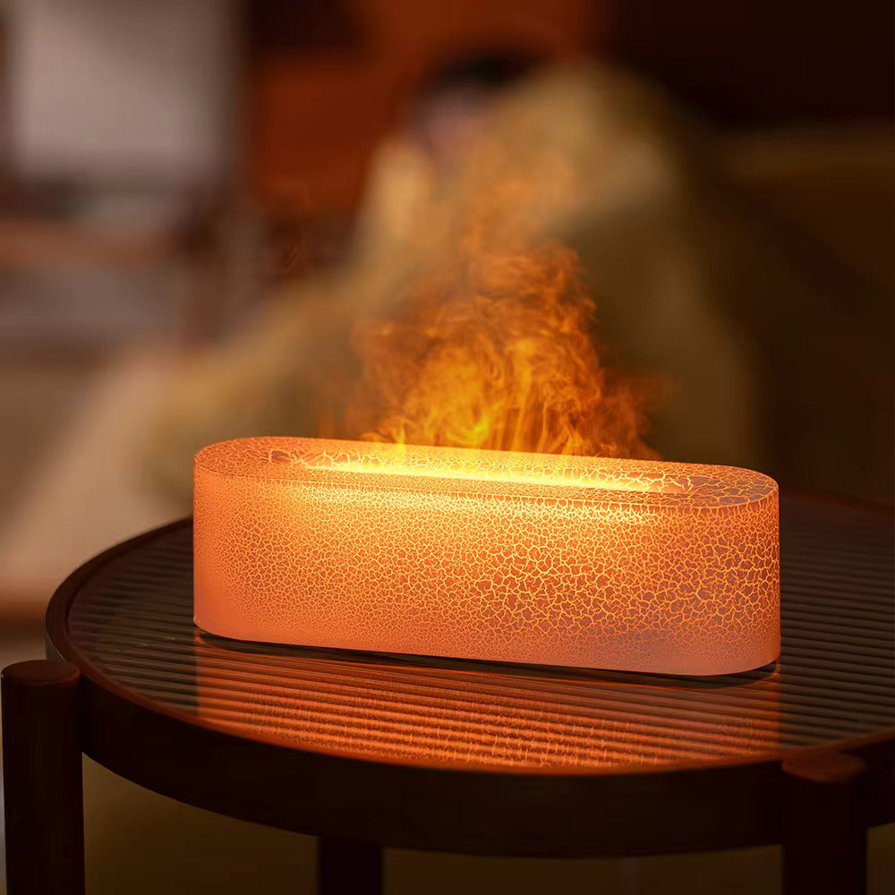 Ceramic fire pit with flames on a wooden table, blurred background