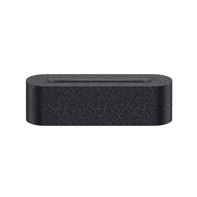 Rectangular black object with a textured surface on a white background