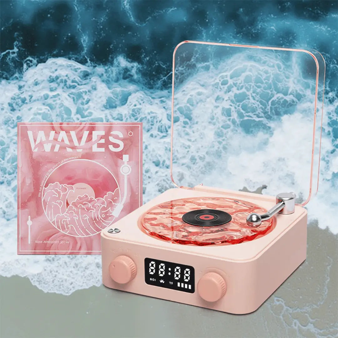 Pink record player with digital display against a blue water background