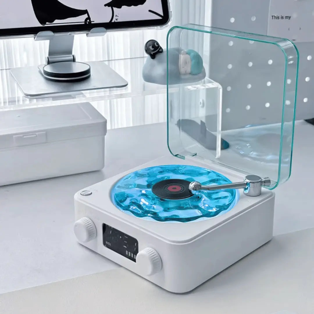 Modern record player with a transparent cover on a desk