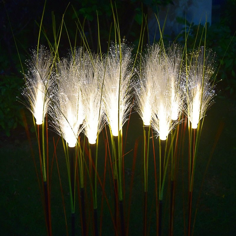 Decorative lights resembling wheat stalks glowing in the dark