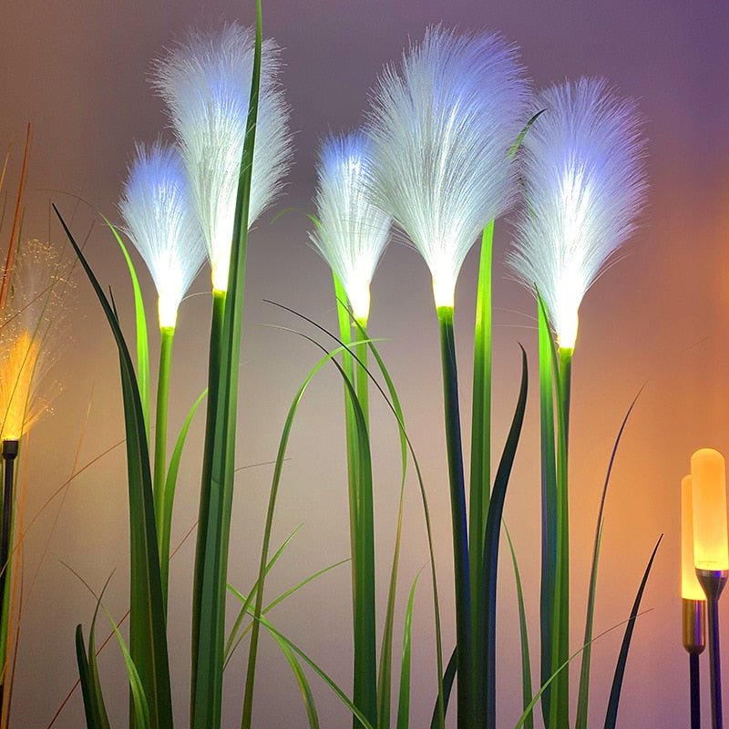 Decorative lights shaped like pampas grass with a gradient background