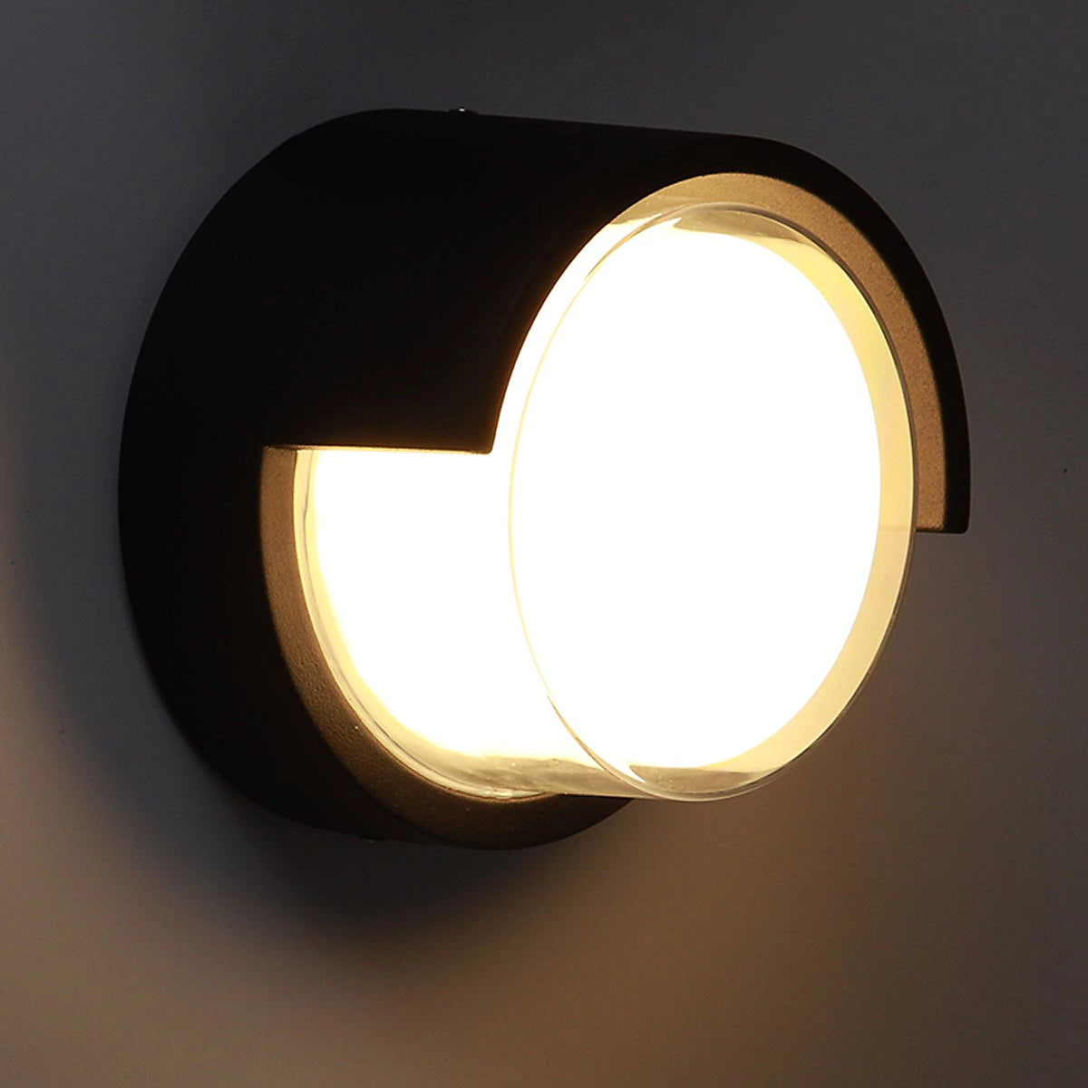 Modern wall light fixture on a dark background