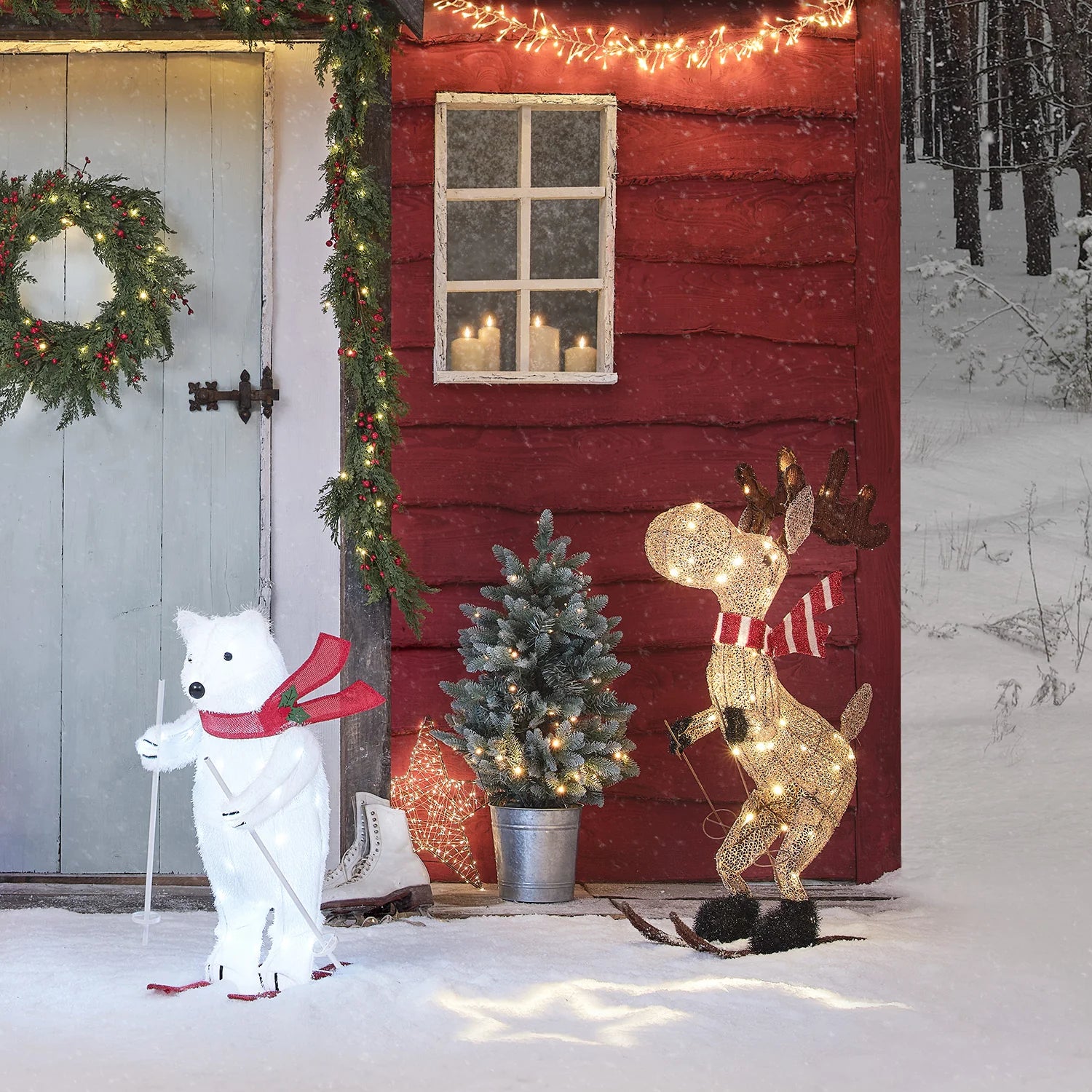 Decorative outdoor scene with a red cabin, polar bear, reindeer, and Christmas tree in the snow.