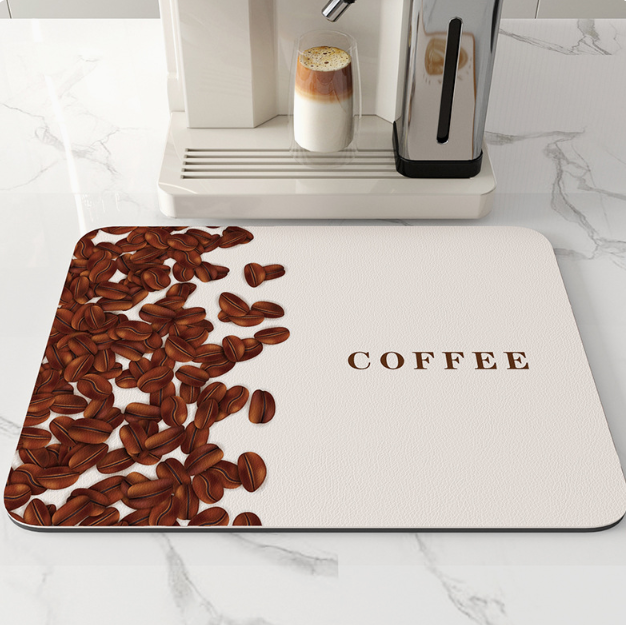 Coffee-themed mouse pad with coffee beans and 'COFFEE' text on a marble surface with a coffee machine.