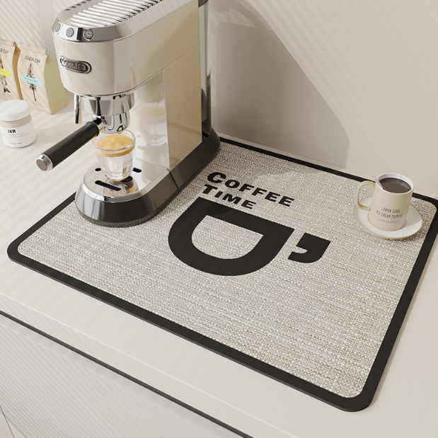 Coffee mat with 'Coffee Time' text in front of an espresso machine.