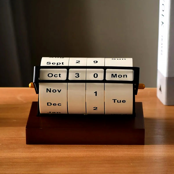 Calendar block on a wooden surface with a dark background