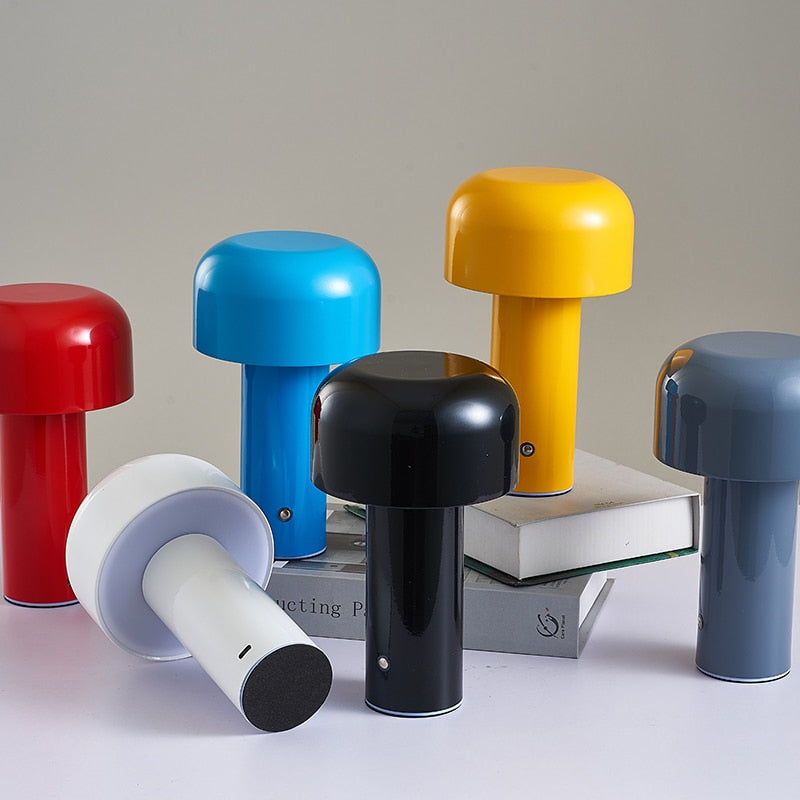 Colorful dumbbell-shaped objects on a neutral background