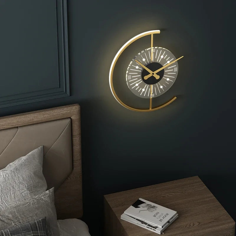 Decorative wall clock with gold accents on a dark wall in a bedroom setting.