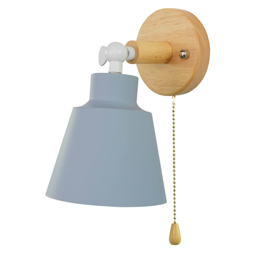 Wall-mounted light fixture with a wooden base and gray shade on a white background