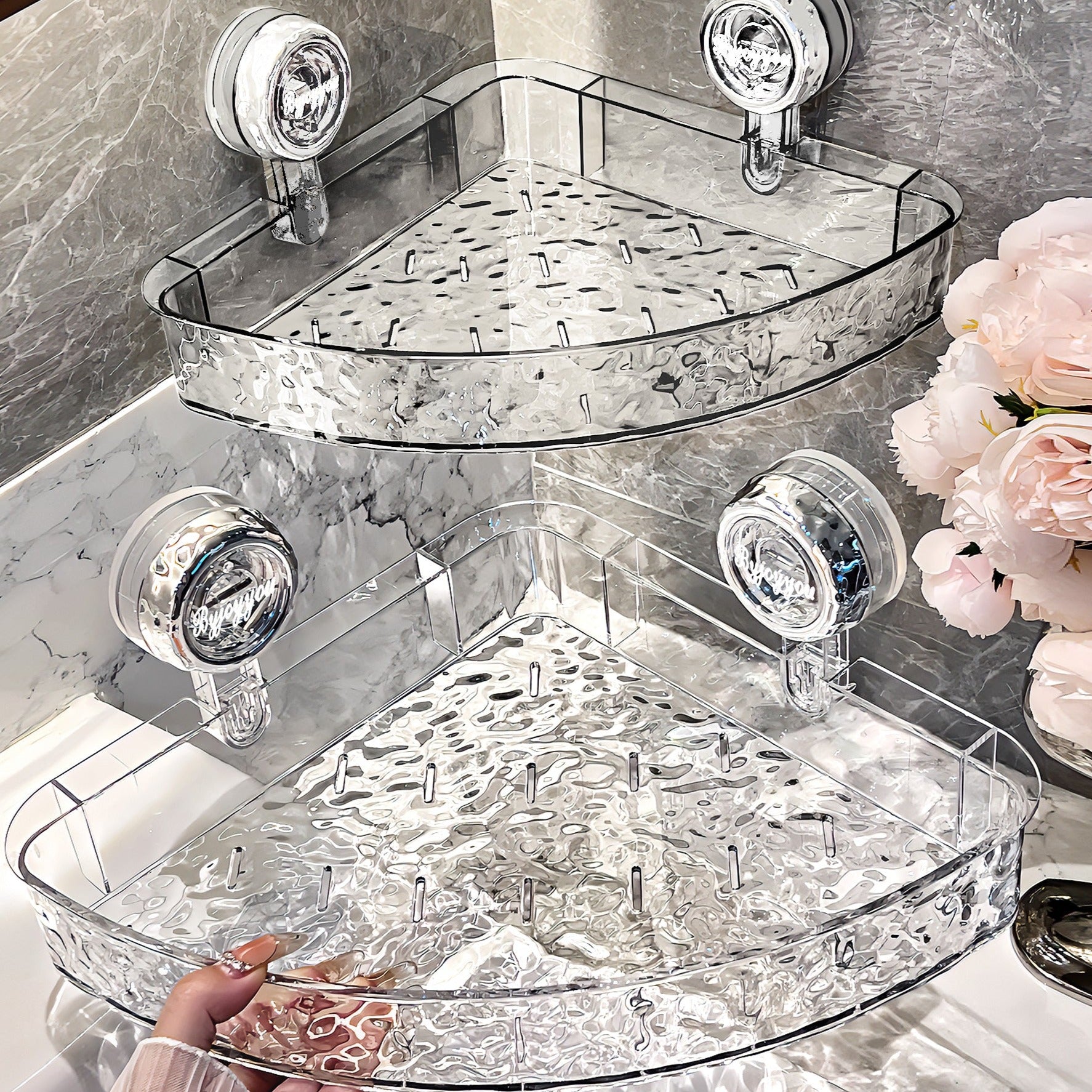 Clear acrylic corner shelf with decorative lights on a bathroom counter.