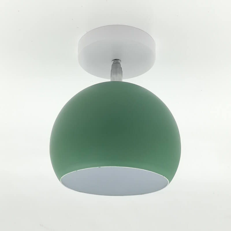 Green ceiling light fixture on a white background