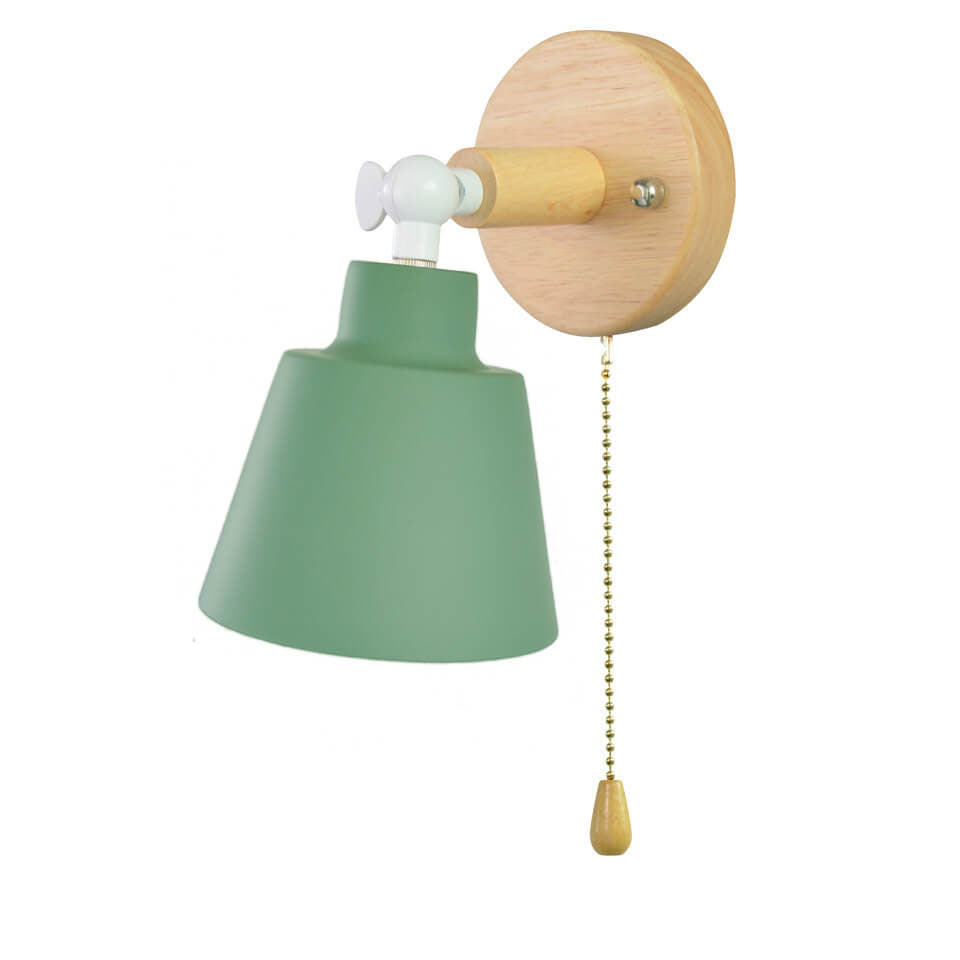 Green wall lamp with wooden pull chain on a white background