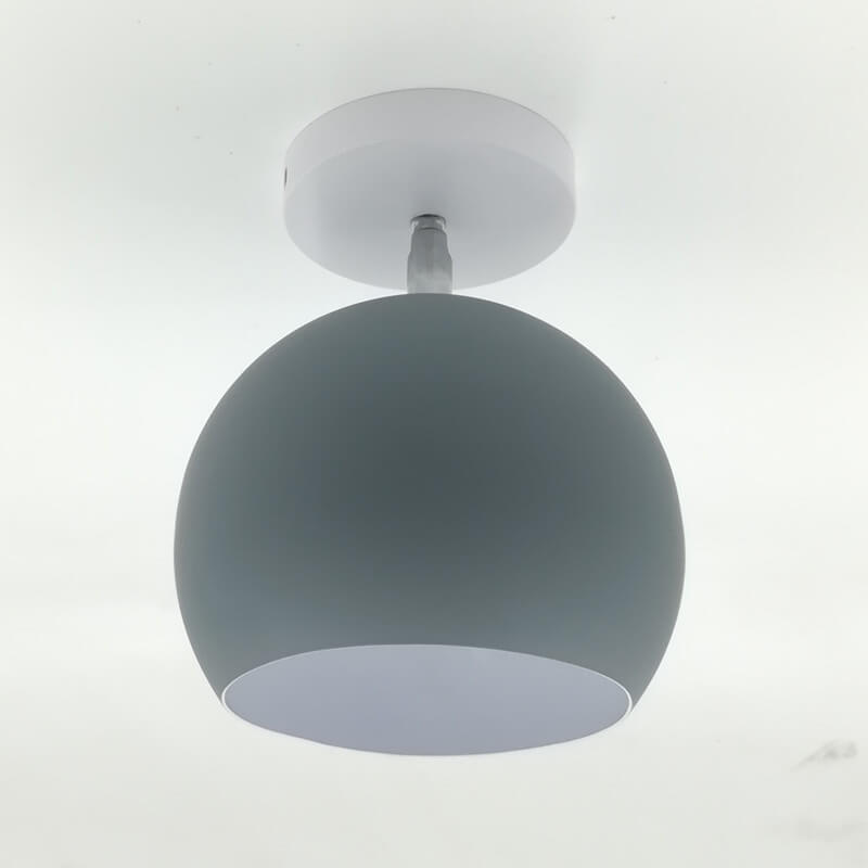 Ceiling light fixture with a gray shade on a white background