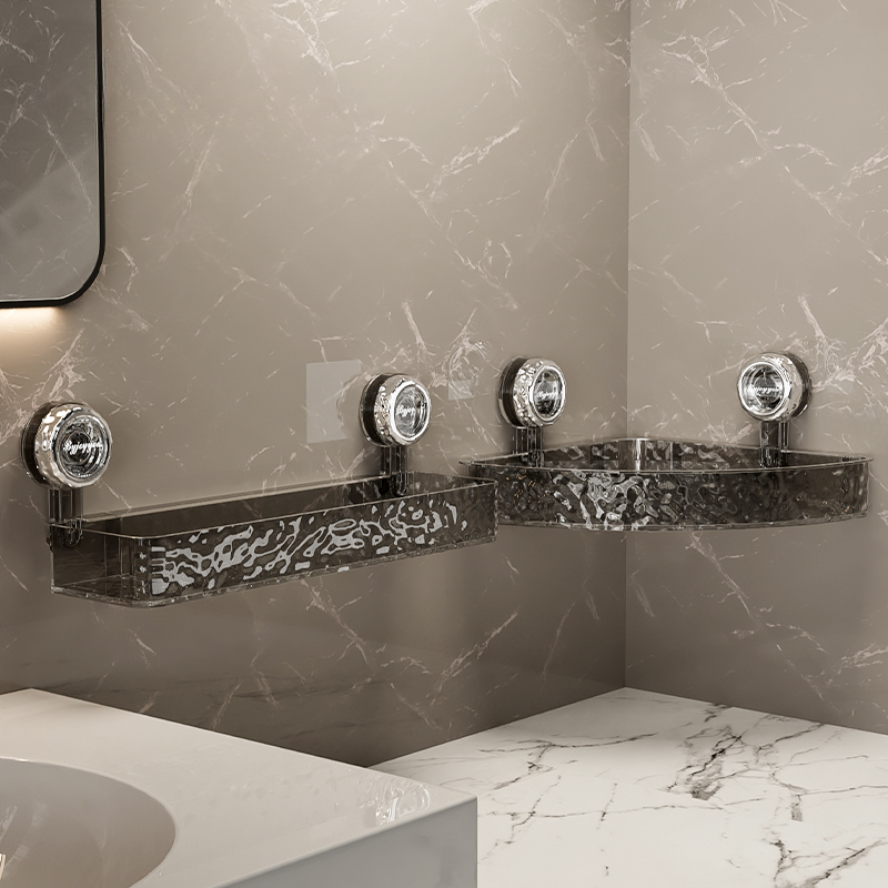 Bathroom corner with marble-patterned wall, countertop, and shelves.