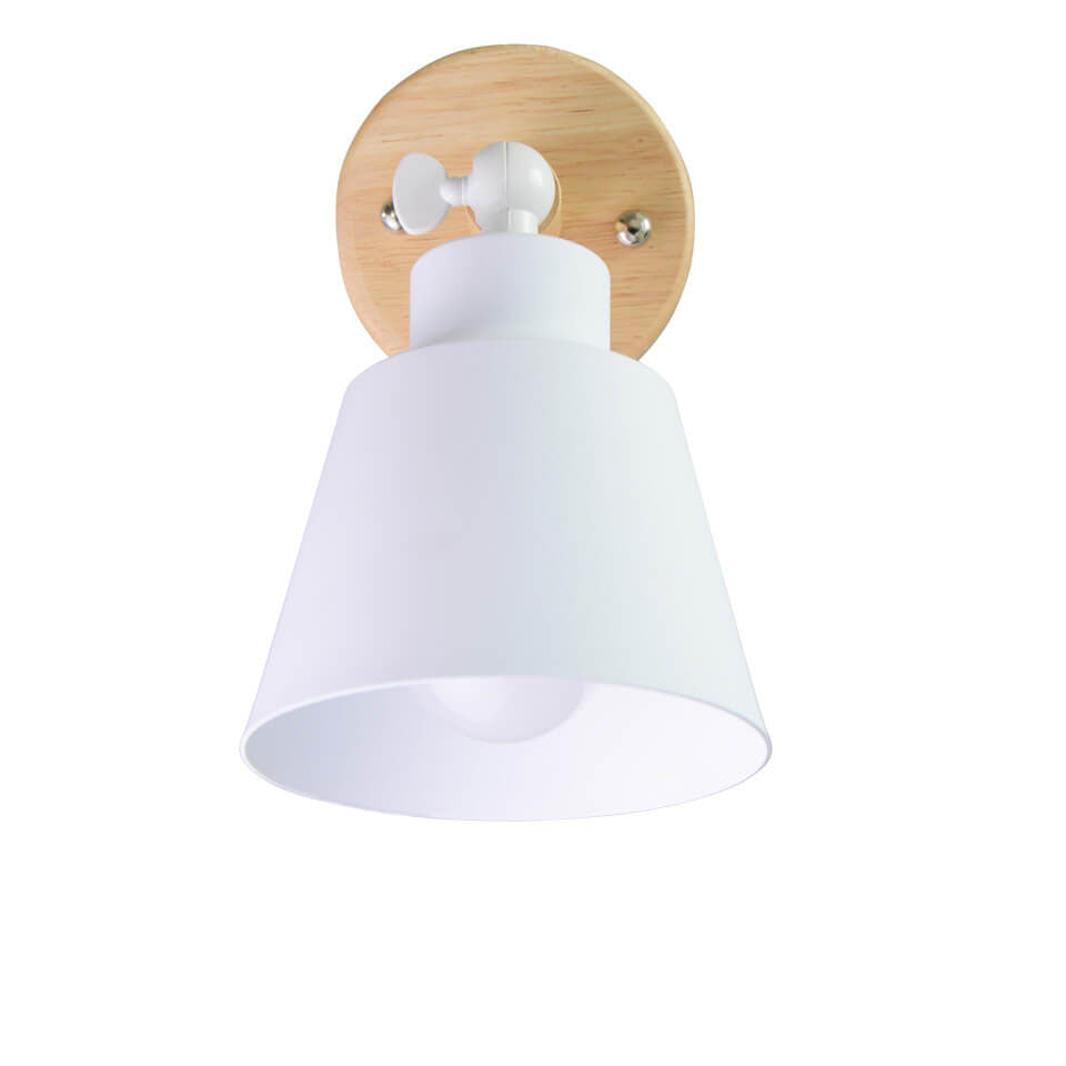 Wall-mounted light fixture with white shade and wooden base on a white background