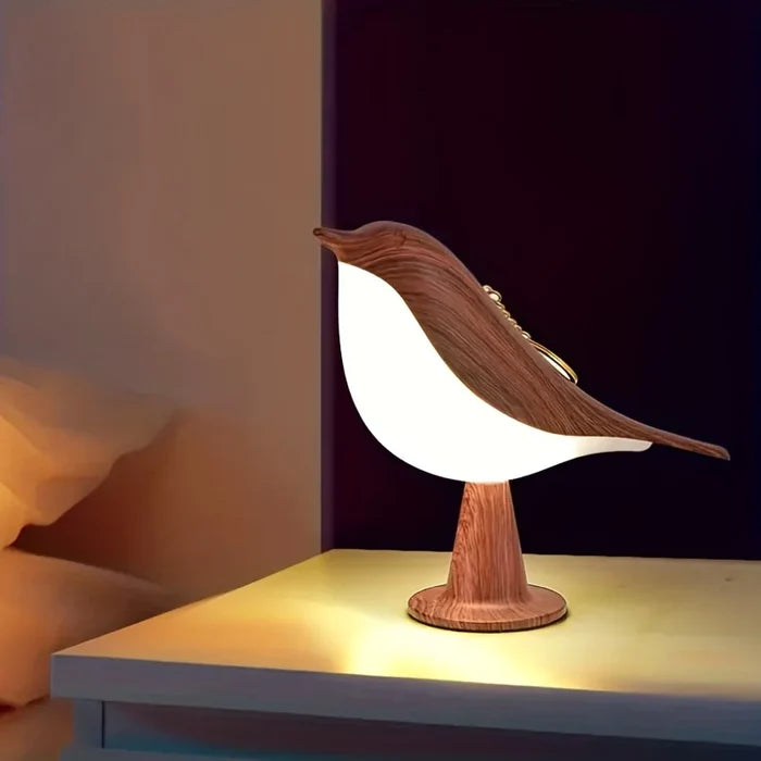 bird-shaped lamps on top with a warm glow.