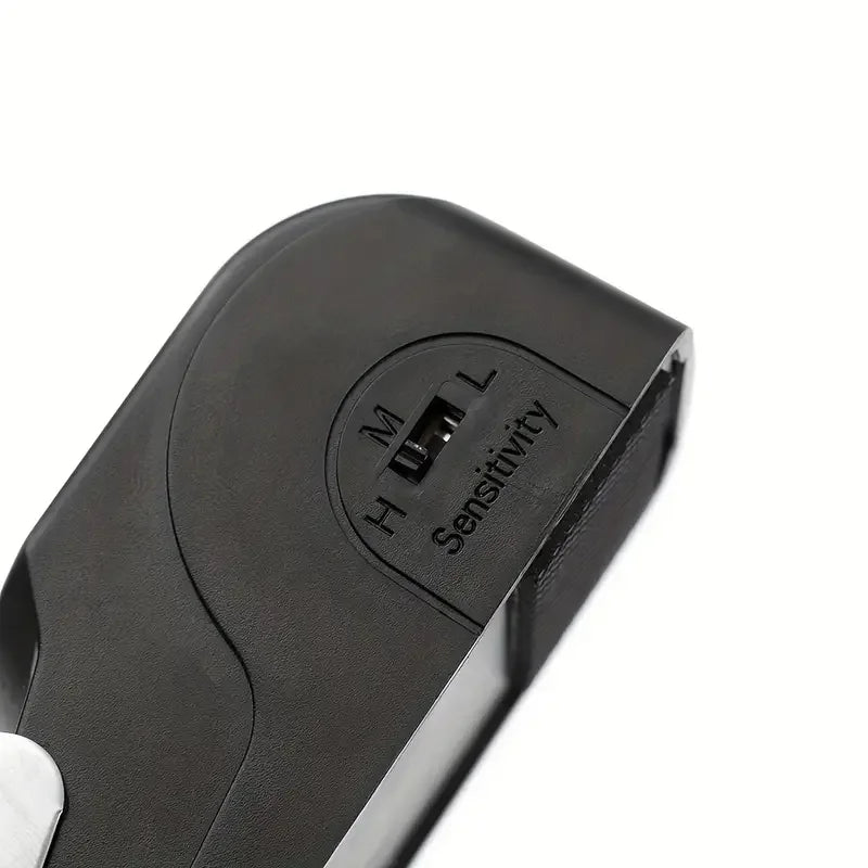 Black electronic device with sensitivity control on a white background