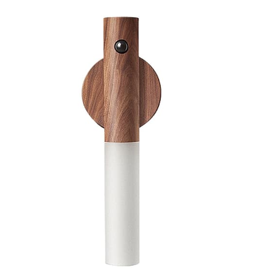 Wooden pepper grinder with white base on a white background